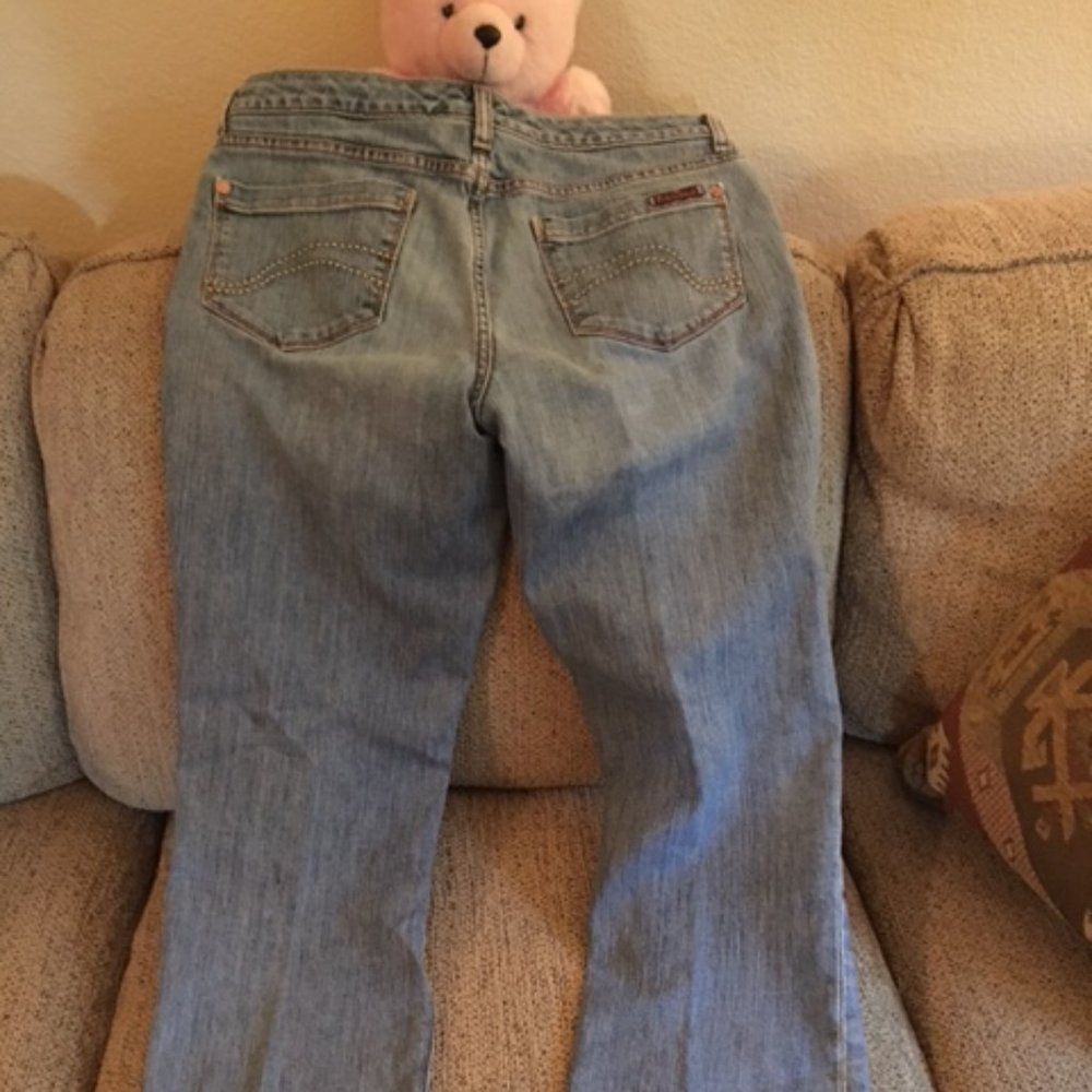 blue jeans with back details and lining top half